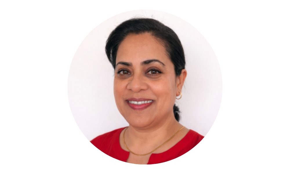 A headshot of Nita Sengupta on a white background